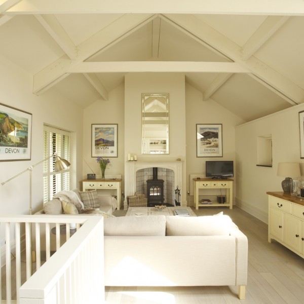 a light cream beamed living area
