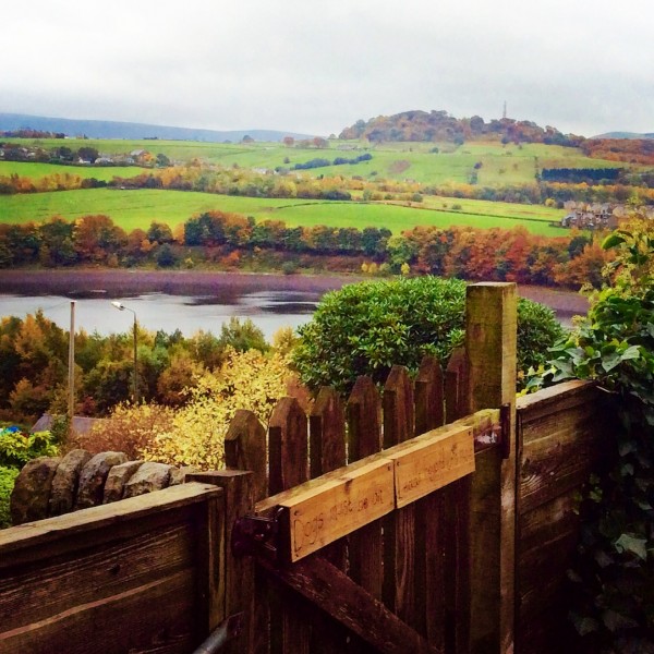 a view of open moorland and reservois in Derbushire Glossop